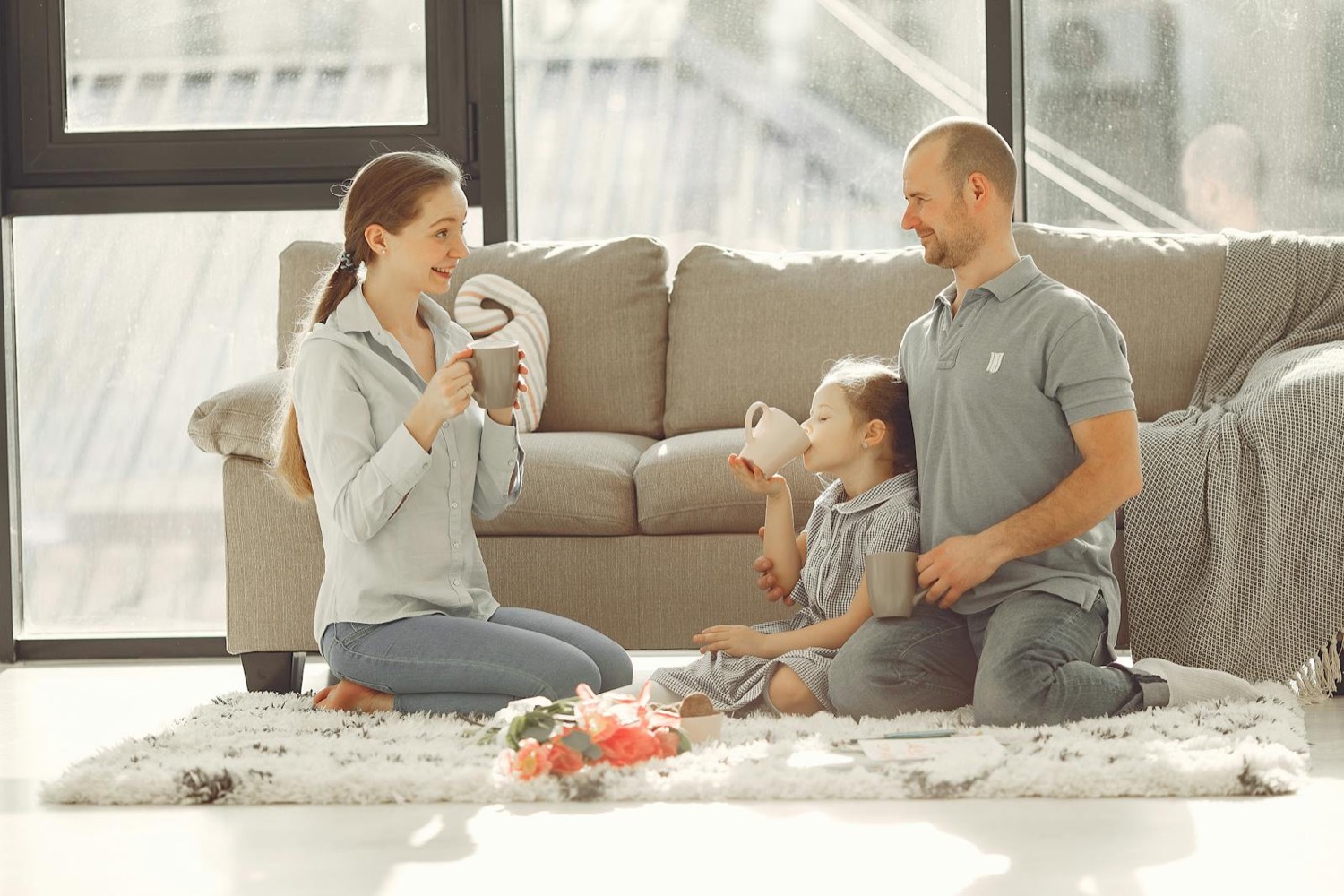A happy family together in the living room of their home