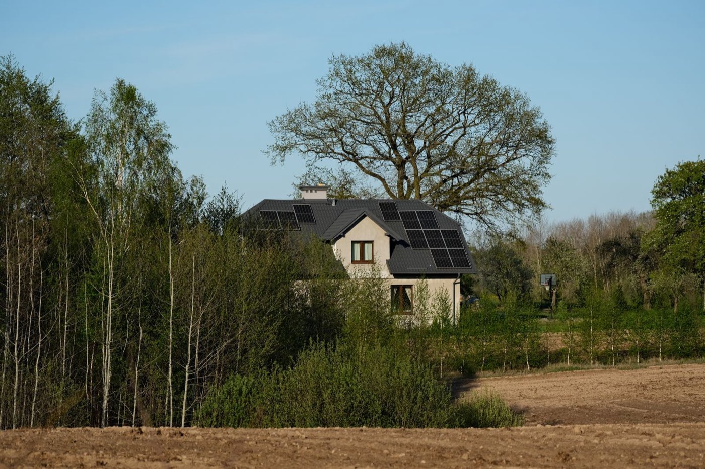 A home with solar panels fitted on the roof